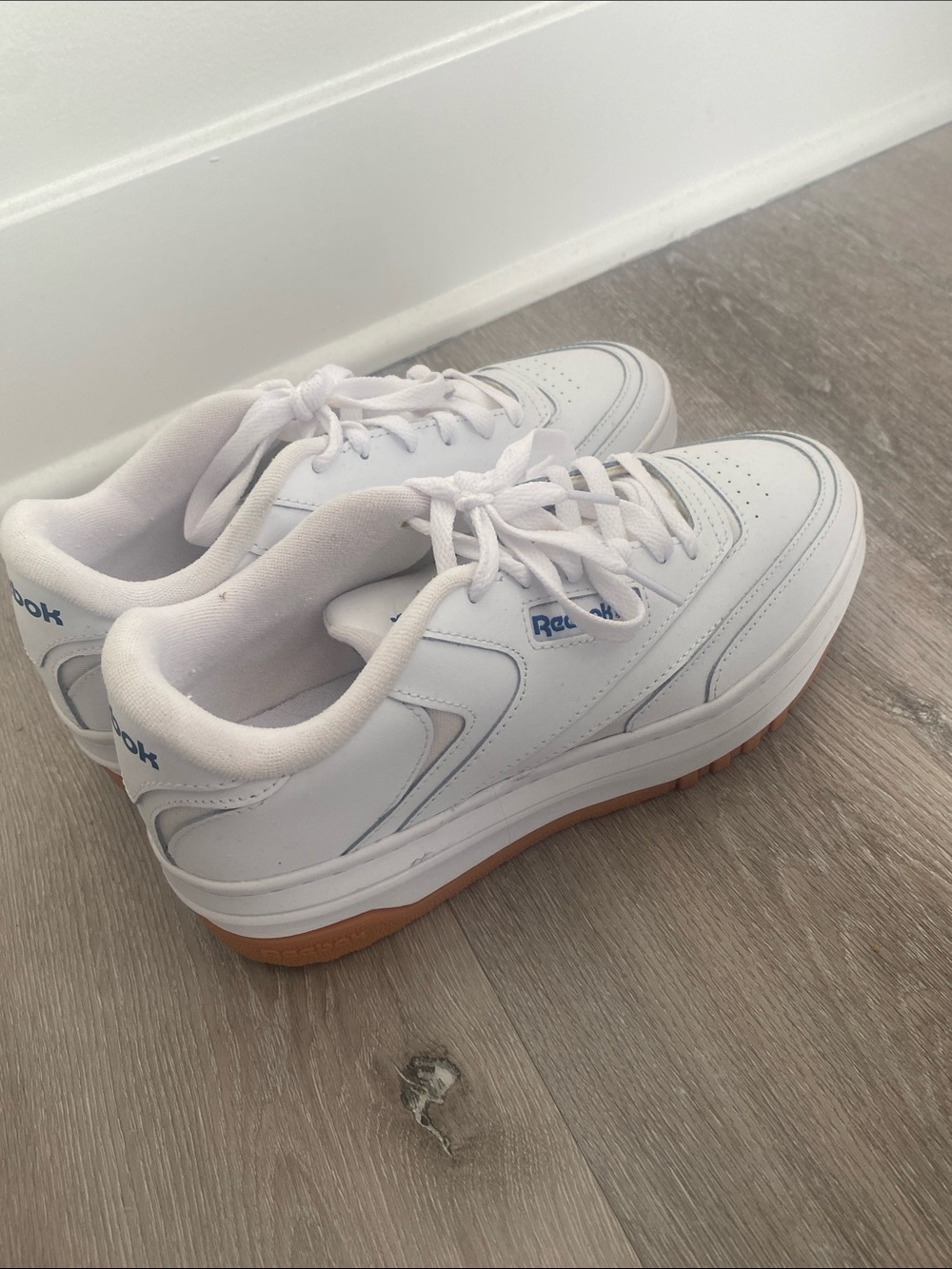 Reebok White Sneakers with Blue Logo and Gum Sole